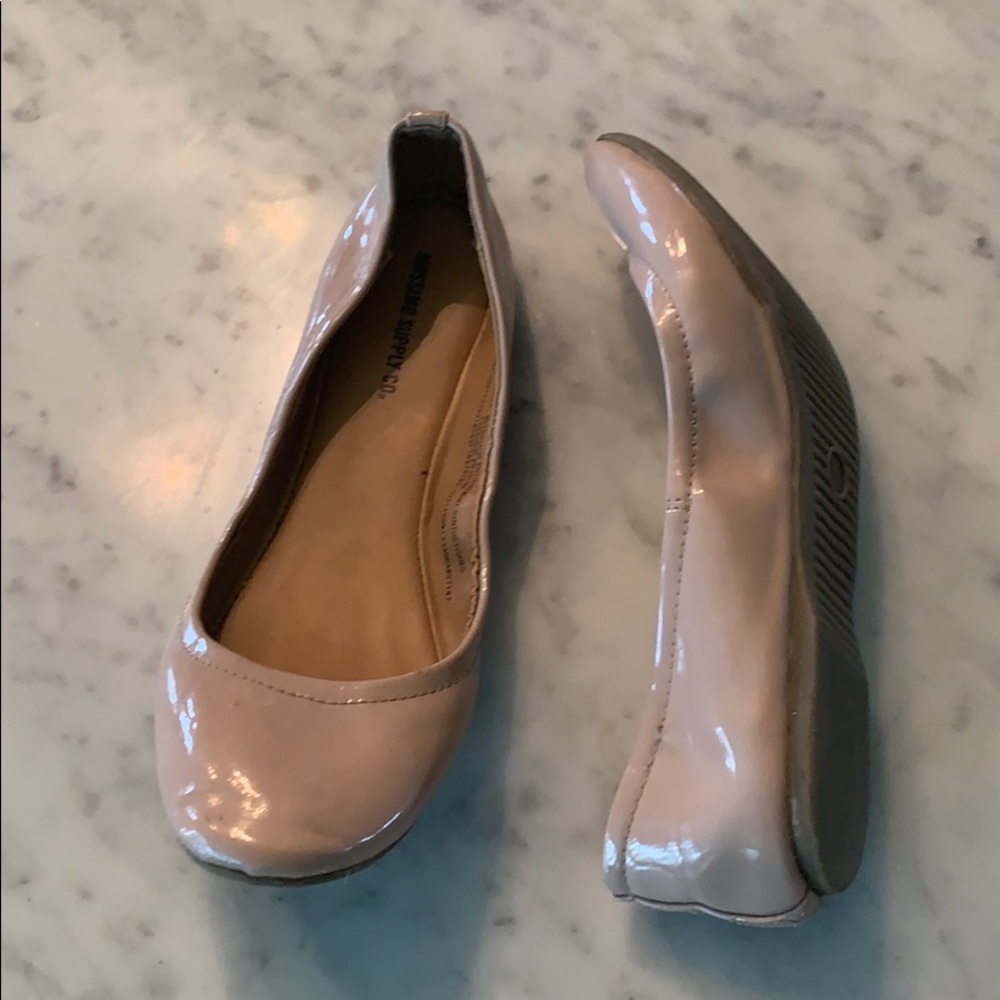 Tan flat shoes